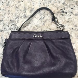 Purple leather COACH wristlet